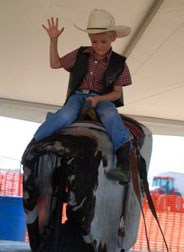 Photo bucking mechanical bull riding